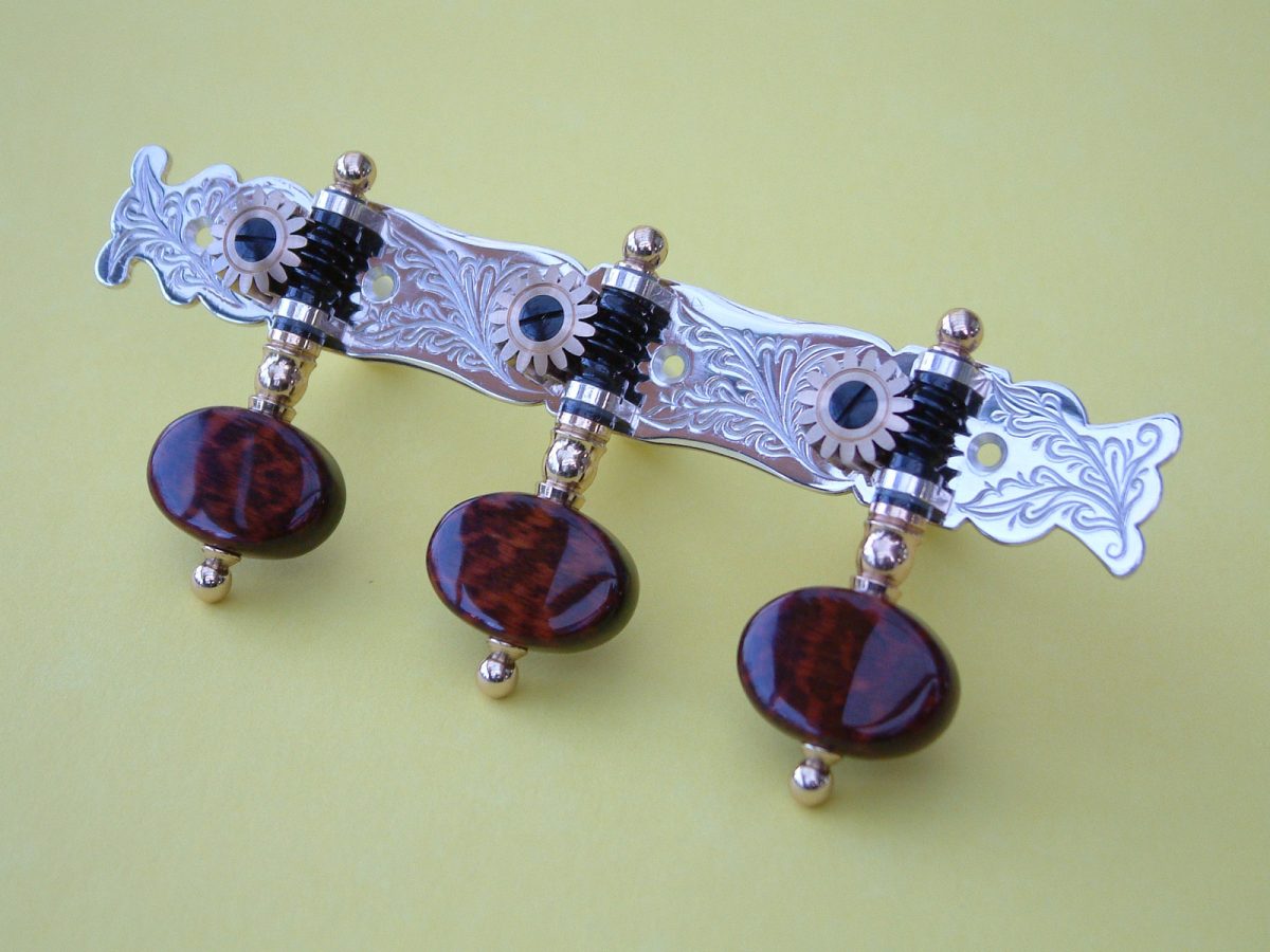 L156 Sterling silver and snakewood buttons