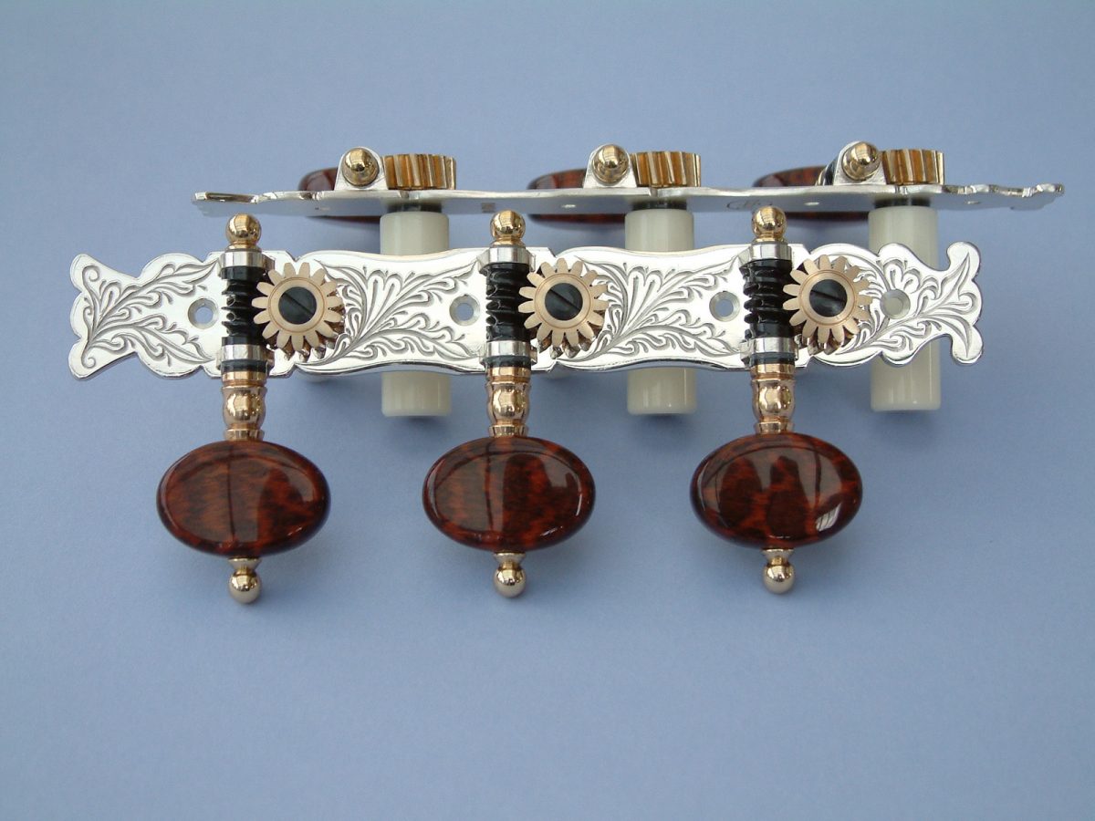 L156 Sterling silver and snakewood buttons