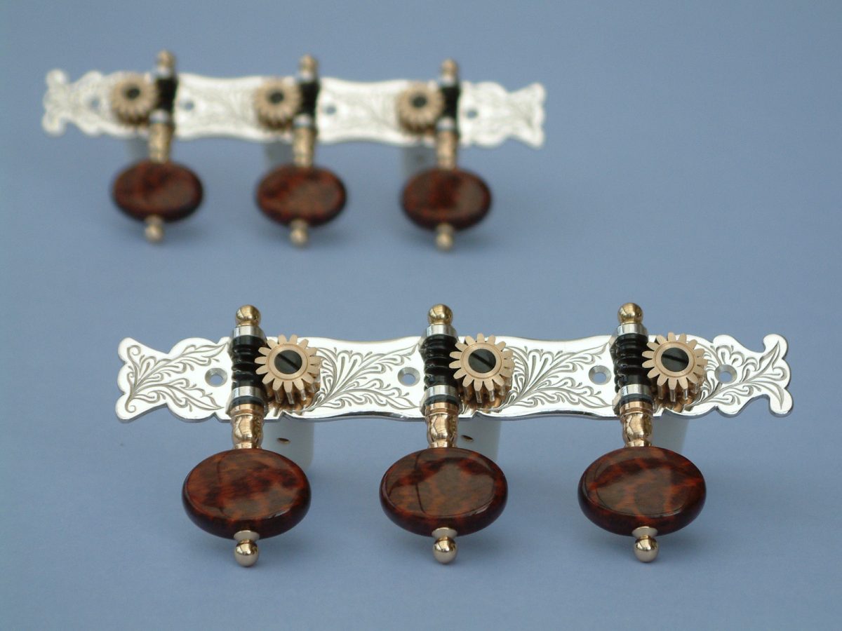 L156 Sterling silver and snakewood buttons