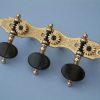 L299 Brass with oval Ebony